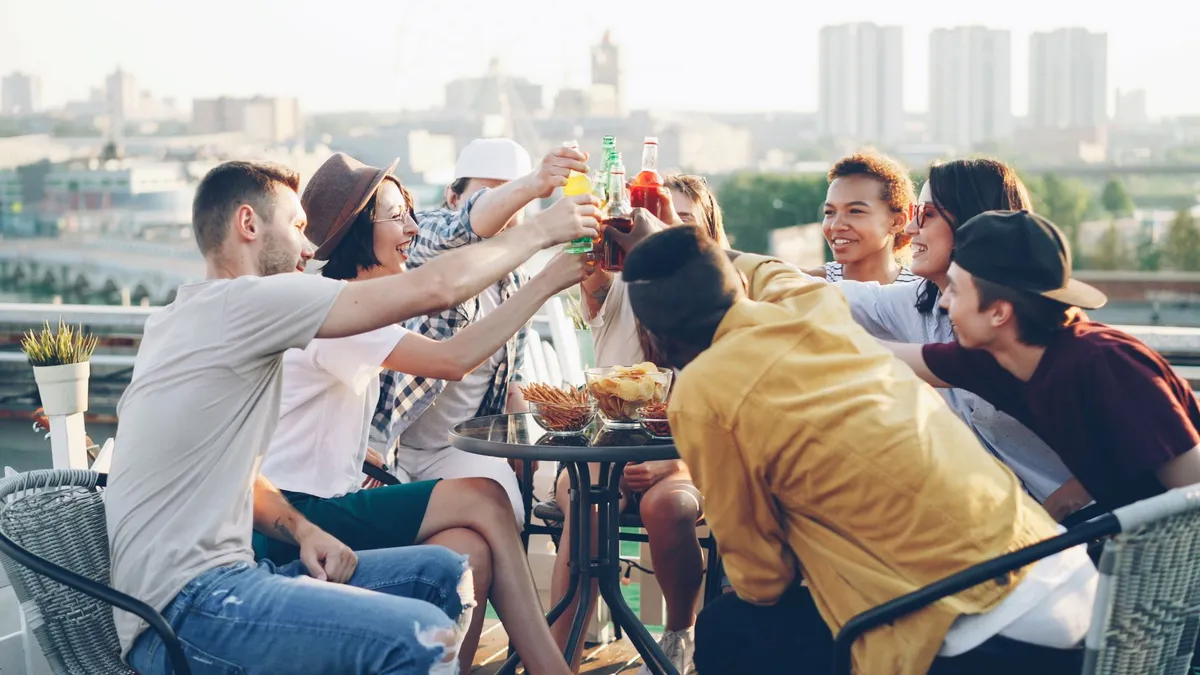 Friends toasting at a plan that made it onto everyone's calendar