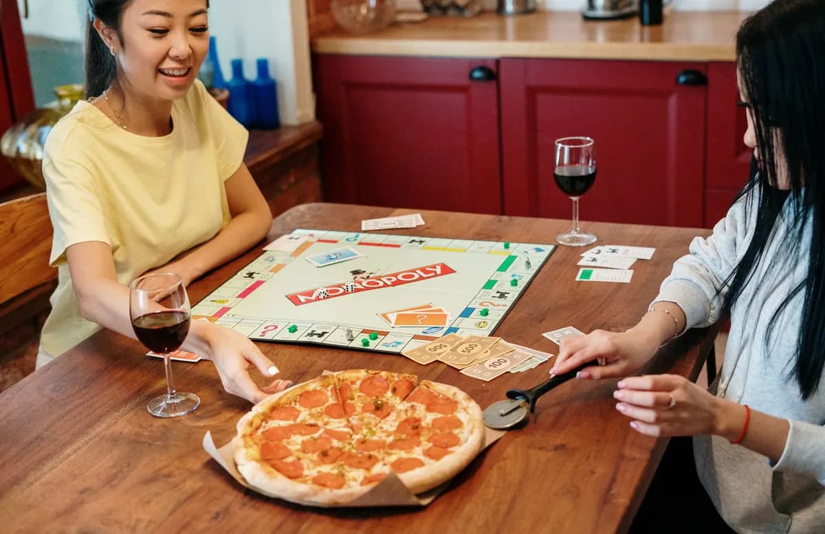 A friend group at game night — the kind of plan Loopin remembers and suggests again